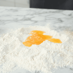flour well with egg for making pasta