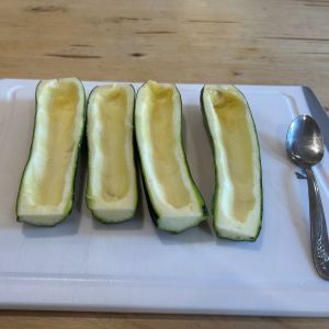hulled zucchini ready to be stuffed