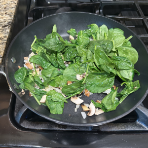 zucchini boat ingredients being sauted